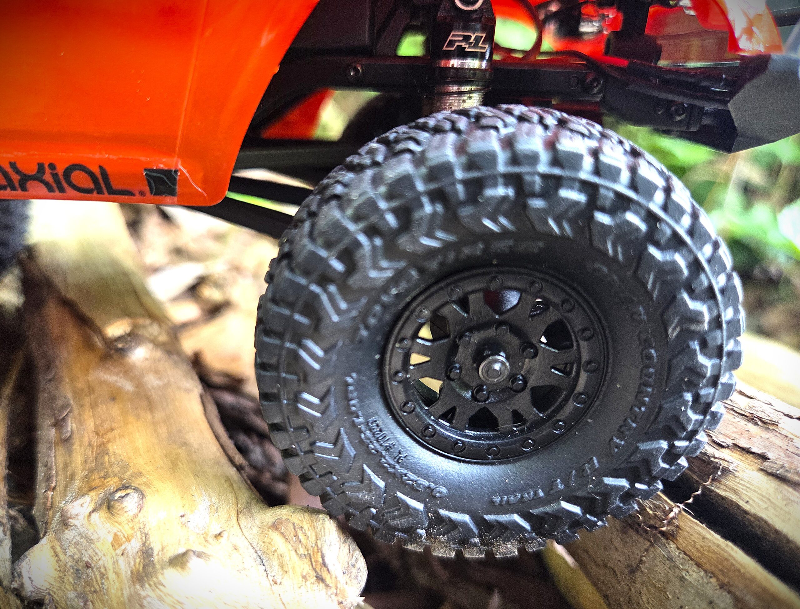 Close-up of Toyo Open Country R/T Trail tire on Axial SCX24 Toyota 4Runner showing tread pattern detail