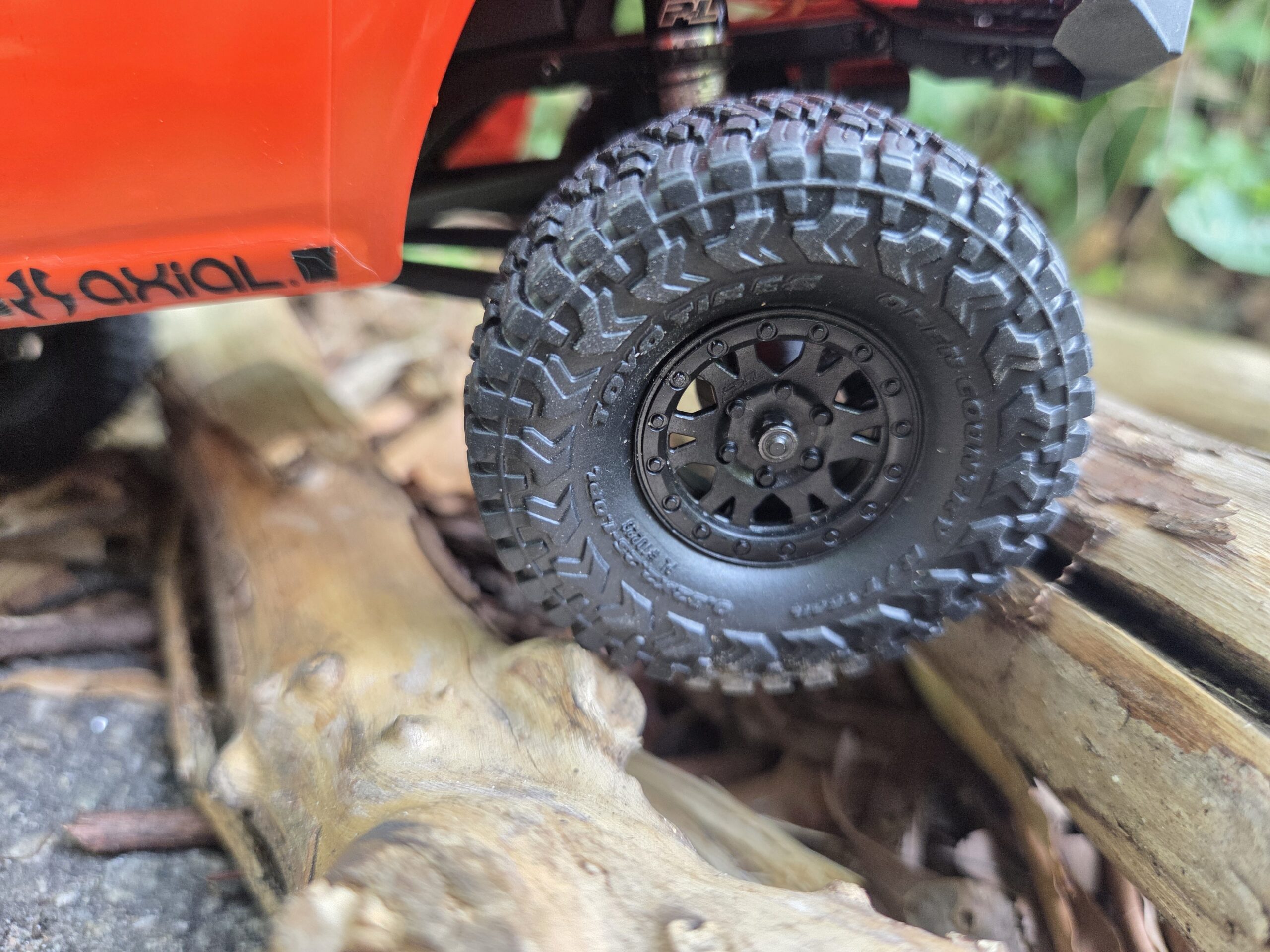 Second close-up angle of Toyo Open Country tire and Pro-Line wheel on Axial SCX24 4Runner RC crawler